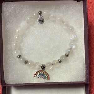 Elegant White Beaded Bracelet with Rainbow Charm